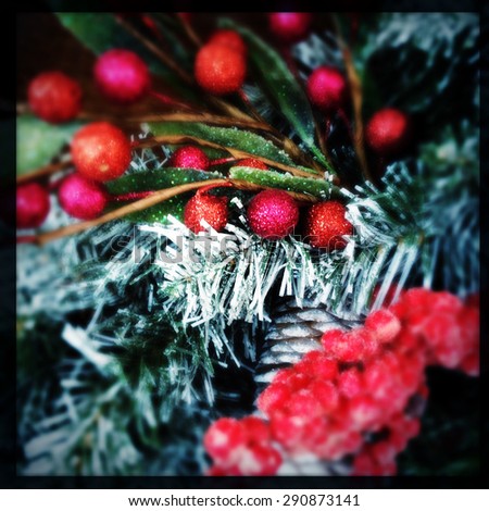 Instagram filtered image of pine and berry Christmas decor
