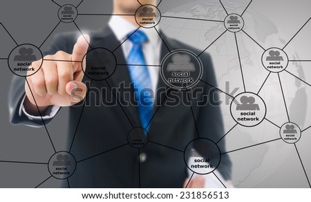 Businessman Pushing Social Network diagram.