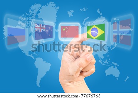 Single finger pressing Brazil flag on world wide.