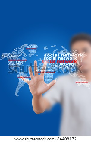 Asian businessman pushing social network world map.