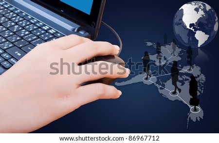 Hand pushing laptop mouse with social network.