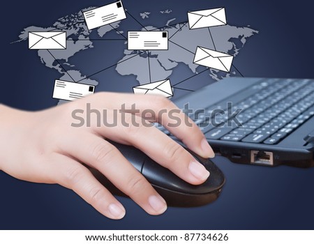Hand pushing laptop keyboard with mail social network.
