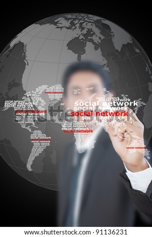 Asian businessman draw social network world map.