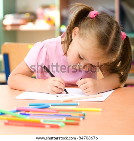 Similar – Image, Stock Photo Focused little kid drawing at table