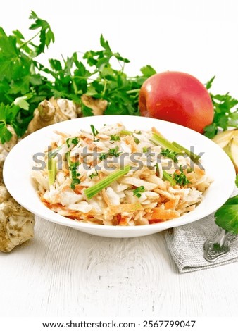 Similar – Image, Stock Photo Plate with raw Jerusalem artichoke on concrete kitchen table with olive oil, herbs and spices. Cooking preparation at home with root vegetable. Top view.