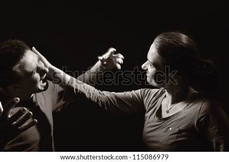 Man and woman screaming at each other. Marriage before the divorce. OTHER PHOTOS FROM THIS SERIES IN MY PORTFOLIO.