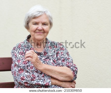 Senior smiling woman.  MANY OTHER PHOTOS FROM THIS SERIES IN MY PORTFOLIO.
