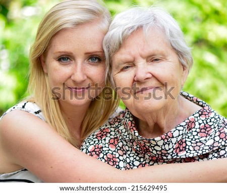 Grandmother and granddaughter. Happy family. MANY OTHER PHOTOS FROM THIS SERIES IN MY PORTFOLIO.