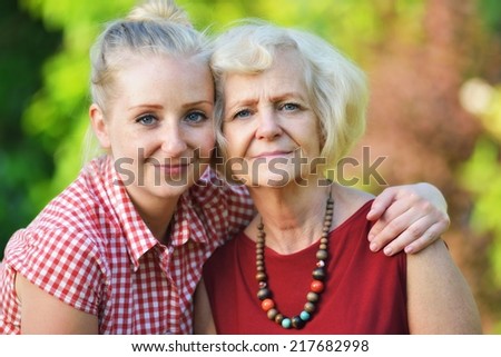 Mother and daughter in park. MANY OTHER PHOTOS FROM THIS SERIES IN MY PORTFOLIO.