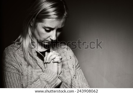 Praying woman. MANY OTHER PHOTOS FROM THIS SERIES IN MY PORTFOLIO.