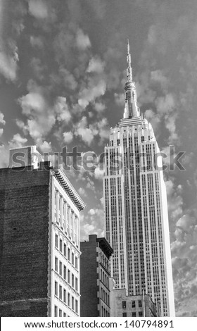 NEW YORK CITY - MAR 22: Empire State Building upward view from street level, March 22, 2011 in New York City. It stood as the world\'s tallest building for more than 40 years (from 1931 to 1972)