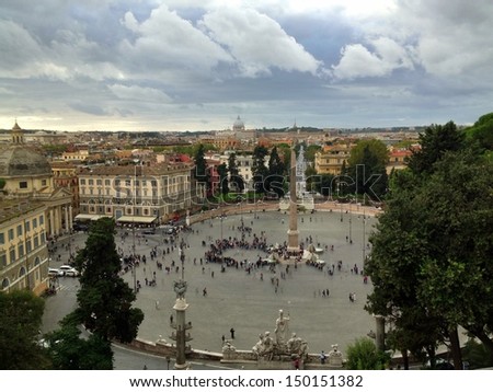 ROME - NOV 1: People walk in Piazza del Popolo, November 1, 2012 in Rome. More than 5 million people come to visit the city each year
