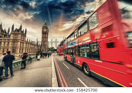 Double Decker Red Bus speeding up in Westminster Bridge - London.