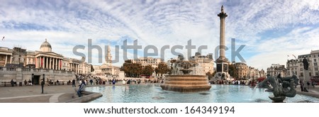 LONDON, SEP 29: Tourists enjoy beautiful Trafalgar Square, September 29, 2013 in London. Nearly 15 million international tourists visit UK capital every year.