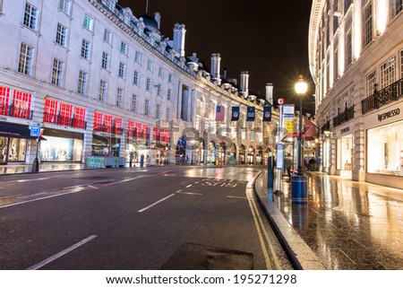 LONDON - SEP 29, 2013: Regent street architecture at night. It was named after Prince Regent, completed in 1825. Every building in Regent Street is protected as a Listed Building