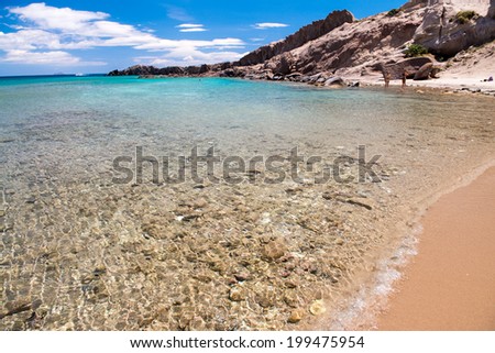 Rocks and crystal clear waters of Paradise Beach, Kos - Greece.