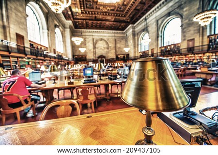 NEW YORK CITY- JUNE 12, 2013: Interior of famous NYC public library. With nearly 53 million items, the NYC Public Library is the second largest public library in the US