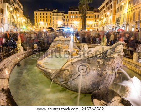 ROME - NOVEMBER 1, 2012: Fountain of Piazza di Spagna is one of the most famous landmarks of Rome. The square owes its name to the palace of Spain, Embassy of the Iberian been to the Holy See