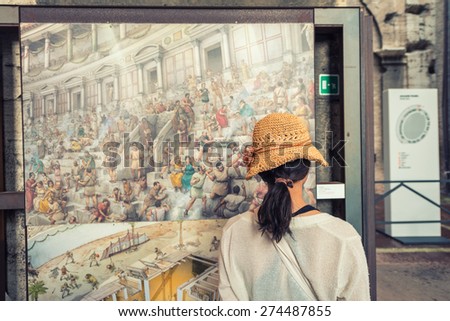 ROME - JUNE 14, 2014: Tourist visits Roman Colosseum interior. Interior gallery around the arena
