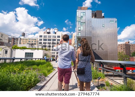 NEW YORK - CIRCA JUNE 2013: The High Line Park, New York, circa June 2013. The High Line is a popular linear park built on the elevated train tracks above Tenth Ave in New York City