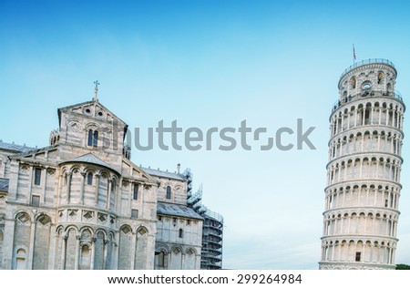 Pisa. Leaning Tower and Cathedral at dusk in Square of Miracles. Tilt-shift lens view.