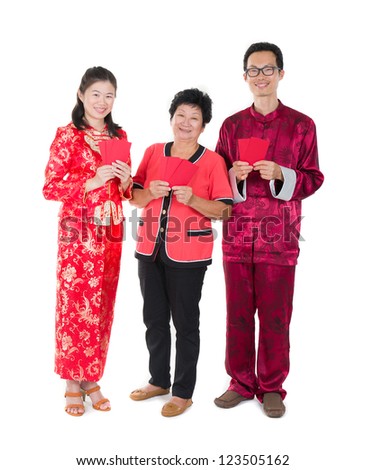 chinese new year family with ang pow symbol of luck