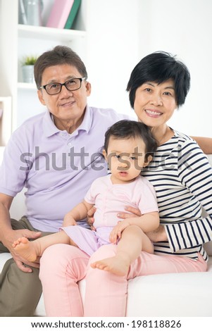 chinese grandparents with granddaugther with life style background