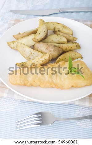 fish and chips food with fork and spoon