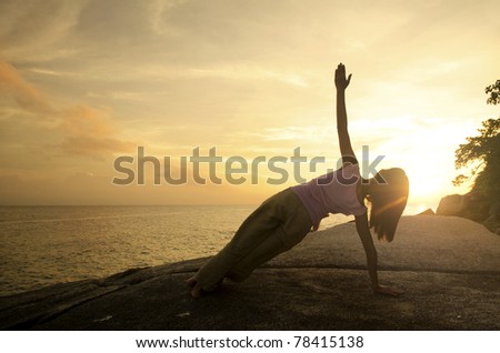asian girl yoga side plank pose