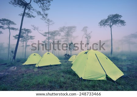 Camping Tent on hill under raining