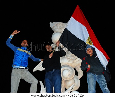 HURGHADA, EGYPT - FEBRUARY 11: People celebrate resignation of Hosni Mubarak from the position of President on February 11, 2011 in Hurghada, Egypt.