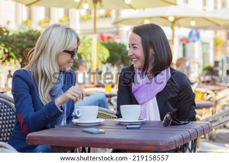 Two friends meeting for a coffee