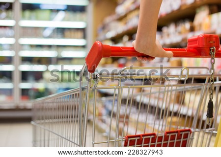 Close-up photo of shopping cart in supermarket
