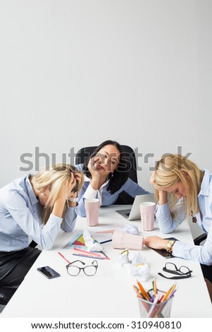 Exhausted women in the office