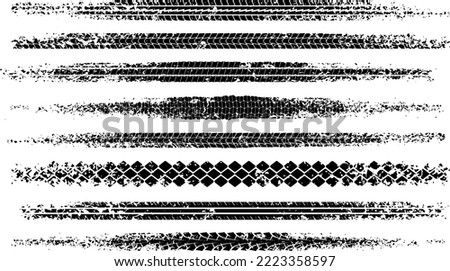 Set of black motorbike tire tread print with grunge effect isolated on white background. Footprint of bike or car wheels with seamless texture. Top view of rubber protector marks on road. Vector brush