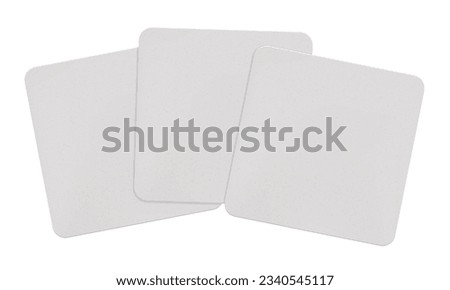 A stack of three white square beer coasters mockup. Blank sample bierdeckels with rounded corners isolated from the background. Cardboard pieces for branding to put under a hot cup or a wet glass.