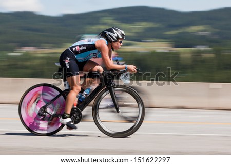 COEUR D ALENE, ID - JUNE 23: Natasha van der Merwe on bike at the June 23, 2013 Ironman Triathlon in Coeur d\'Alene, Idaho.