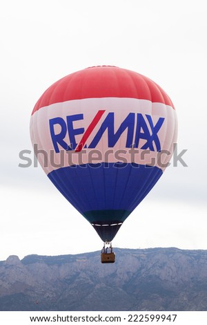 Albuquerque, NM, October 8:  The Remax balloon floating near the Sandia Mountains at the Balloon Fiesta in Albuquerque, New Mexico on October 8th, 2014.