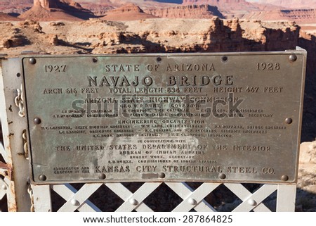 LEE\'S FERRY, ARIZONA - JANUARY 25 2011:A historic sign gives technical information about the Navajo Bridge over the Colorado River north of the Grand Canyon National Park,  a major tourist attraction.