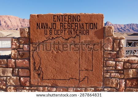 LEE\'S FERRY, ARIZONA - JANUARY 25 2011: A rock sign showing a map area of the Navajo Nation placed by the Navajo Bridge just north of the Grand Canyon National Park which is a major tourist attraction.