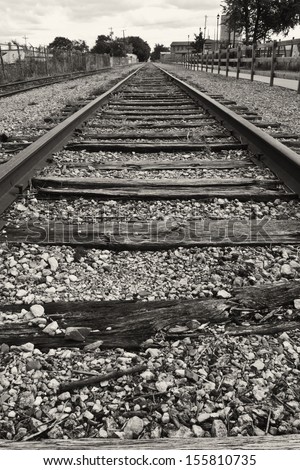 Train Track To Nowhere - Old Obsolete Train Tracks Out of Service Run To the Horizon Empty