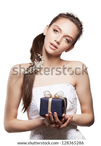 Beautiful elegance bride with small gift box