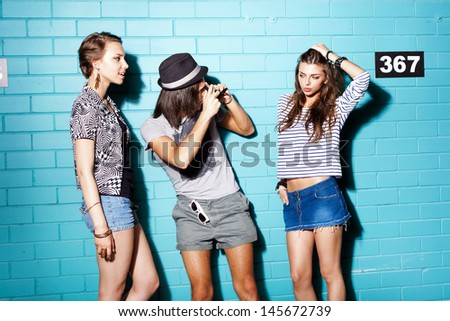 Two young girls and guy having fun. Lifestyle