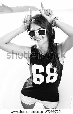 Stylish beautiful young hipster tourist woman s have fun and good mood outdoor in summer