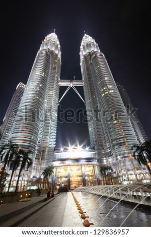 KUALA LUMPUR - FEB 23: View of The Petronas Twin Towers on FEB 23, 2013 in Kuala Lumpur, Malaysia. It is famous landmark of Malaysia. Petronas are the tallest twin buildings in the world (451.9 m).