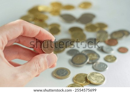 Image, Stock Photo A handful of cent coins