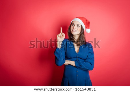 Christmas Santa hat isolated woman portrait . Smiling happy girl on background.