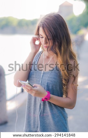Woman checking her fitness smart watch device