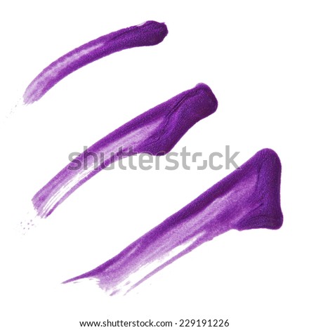 Blots of purple nail polish isolated on white background