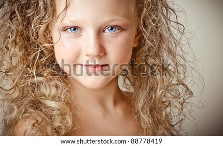 Little Cute Blonde Baby With Curls And Blue Eyes Stock Photo 88778419 ...